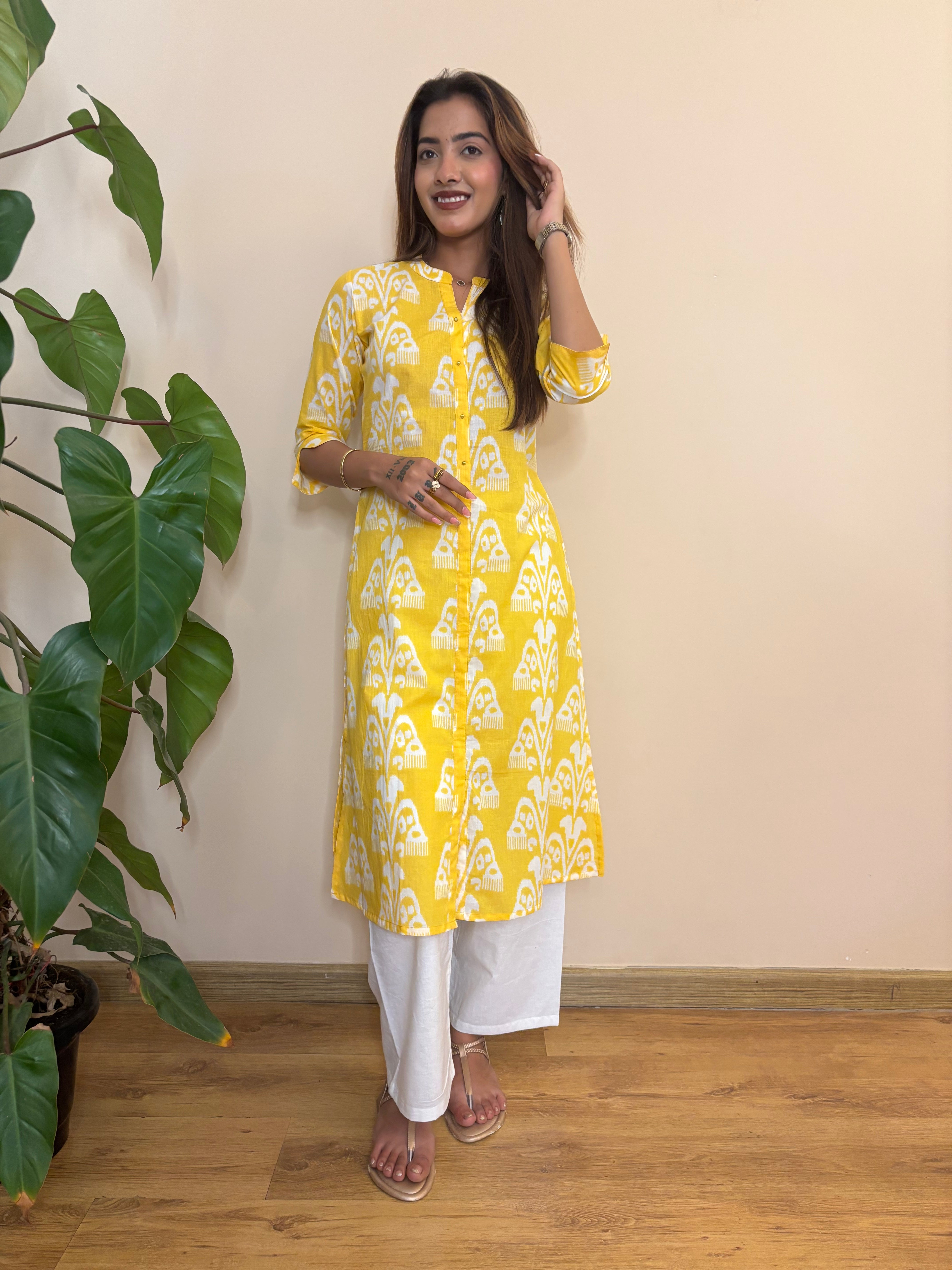 Front view of yellow printed cotton womens kurta