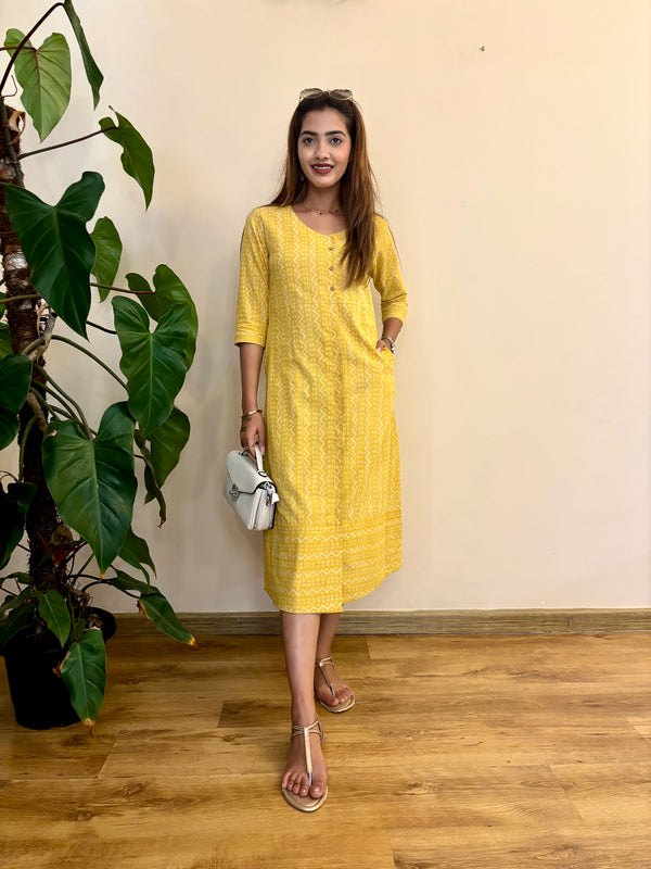 Front view of yellow and block print cotton womens dress